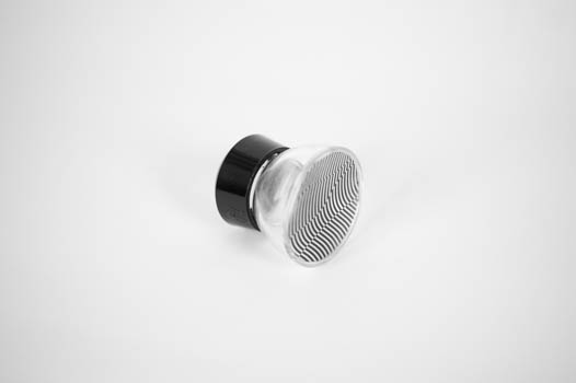 Top-side perspective of magnifying glass in superposition exhibit
