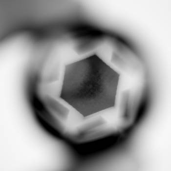 View through magnifying glass in quantum physics art installation
