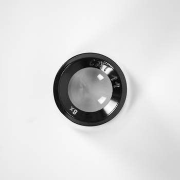 Top-down view of magnifying glass in Schrödinger art installation